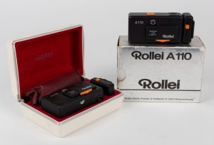 FRANKE & HEIDECKE: Two satin-black Rollei A110 subminiature cameras [#3242194 & #3222027] with Tessar 23mm f2.8 lenses, circa 1978, with one in maker's box with flash unit, neck chain, and instruction booklet. (2 cameras)