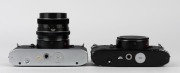 FRANKE & HEIDECKE: Two Rolleiflex SL35 SLR cameras, circa 1970, one [#4004994] made in Germany with chrome-body&nbsp;and Planar 50mm f1.8 lens [#5190066], and one [#4038628] with body only, in black, made in Singapore. (2 cameras) - 5