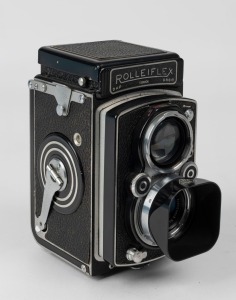 FRANKE & HEIDECKE: Rolleiflex Automat TLR camera [#1056206], circa 1939, with Xenar 75mm f3.5 lens [#1865541] and Compur-Rapid shutter, with metal lens hood. 