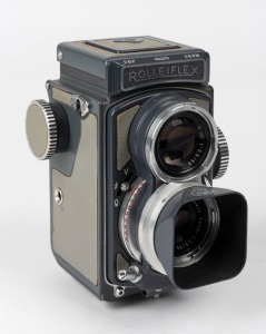 FRANKE & HEIDECKE: Rolleiflex 4x4 'Grey Baby' TLR camera [#2042275], circa 1958, with Xenar 60mm f3.5 lens [#5593784] and Synchro-Compur shutter, with metal lens hood.