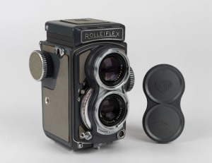 FRANKE & HEIDECKE: Rolleiflex 4x4 'Grey Baby' TLR camera [#2049622], circa 1959, with Xenar 60mm f3.5 lens [#5655792] and Synchro-Compur shutter, with plastic lens cap.