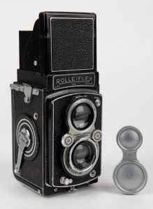 FRANKE & HEIDECKE: Rolleiflex Automat I TLR camera [#741081], circa 1938, with Tessar 75mm f3.5 lens [#2244273] and Compur-Rapid shutter, together with metal lens cap.