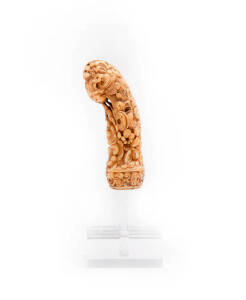 MADURESE KRIS HILT: Carved ivory, late 18th century. The style of this Kris hilt is also known as kojuk mrenges. Similar examples can be found illustrated & described in Ghiringhelli [2011,pp. 98,102, 203] which presents the famous Lanfranchi Collection o