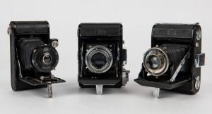 ZEISS IKON: Three vertical folding cameras - one circa 1949 Ikonta 521 [#P 85347] with Tessar 75mm f3.5 lens, one circa 1929 Ikonette 504/12 with Frontar 80mm f9 lens, and one circa 1937 Nettar 515 [#C 44875] with Nettar 75mm f4.5 lens. (3 cameras) 