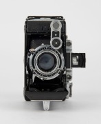 ZEISS IKON: Super Ikonta C 531/2 vertical-folding camera [#P 10820], circa 1950, with Tessar 105mm f3.5 lens [#87064]. - 2