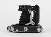 ZEISS IKON: Super Ikonta C 531/2 vertical-folding camera [#P 10820], circa 1950, with Tessar 105mm f3.5 lens [#87064]. - 5