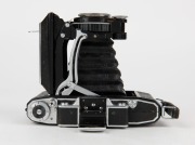 ZEISS IKON: Super Ikonta C 531/2 vertical-folding camera [#X 27539], circa 1950, with Tessar 105mm f3.5 lens [#816621]. - 4