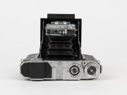 ZEISS IKON: Super Ikonta B 532/16 horizontal-folding camera [#T 9693], circa 1952, with Tessar 80mm f2.8 lens [#651417] and Synchro-Compur shutter. - 4