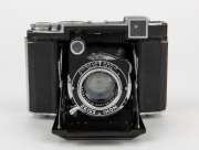 ZEISS IKON: Super Ikonta B 532/16 horizontal-folding camera [#H 12946], circa 1939, with Tessar 80mm f2.8 lens [#2576596] and Compur-Rapid shutter. - 2