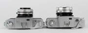 NIPPON KOGAKU: Two Nikkorex SLR cameras - one 1960&nbsp;Nikkorex 35&nbsp;[#75074] with Nikkor-Q&nbsp;50mm f2.5 lens [#171161], and one 1962&nbsp;Nikkorex&nbsp;35-2 with Nikkor-Q&nbsp;50mm f2.5 lens [#380731] and front lens cap. (2 cameras) - 4