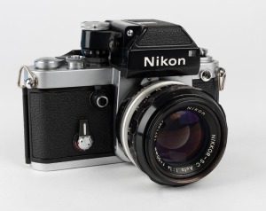 NIPPON KOGAKU: Nikon F2 Photomic SLR camera [#F2 7448270], circa 1974, with Nikkor-S·C 50mm f1.4 lens [#1571387], and F2 DP-1 Photomic finder accessory.