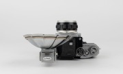 NIPPON KOGAKU: Nikon F&nbsp;Photomic&nbsp;T SLR&nbsp;camera [#6766494], circa 1965, with Nikkor-S Auto 35mm f2.8 wide-angle lens [#371067], Photomic T metering prism, and Nikon F BC-7 flash unit attachment. - 4