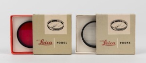 LEITZ: Two Leica E48 lens filters - one POOGL/13315 light red and one POOFX/13330 UVa, both with original maker's boxes and plastic cases. (2 items)