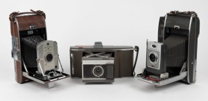 POLAROID: Three instant rollfilm cameras - one circa 1948 Polaroid 95, one circa 1960 Polaroid 900, and one circa 1961 Polaroid J-66. (3 cameras)