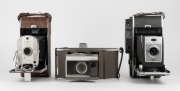 POLAROID: Three instant rollfilm cameras - one circa 1948 Polaroid 95, one circa 1960 Polaroid 900, and one circa 1961 Polaroid J-66. (3 cameras) - 2