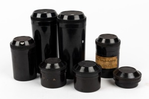LEITZ: Seven Leica lens containers for Hektor, Elmar, and Summar lenses of various sizes. (7 items)
