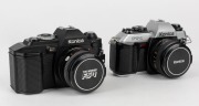 KONICA: Two black-body circa 1983 SLR cameras - one FT-1 Motor&nbsp;T [#248830] with Hexanon&nbsp;AR 50mm f1.8 lens [#7003928], and one FS-1 [#501991] with Hexanon&nbsp;AR 50mm f1.7 lens [#7637612], both with front lens caps. (2 cameras)