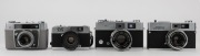 KONICA: A selection of four circa 1960s&nbsp;zone-focusing and rangefinder cameras - one Konica L [#164299] with lens cap, one Konica Eye [#155048] with wrist strap, one EE-Matic Deluxe F [#125690], and one Auto S2 [#572604] with lens cap. (4 cameras)
