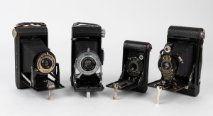 KODAK: A selection of four different vertical-folding cameras, with various lens and shutter combinations. (4 cameras)