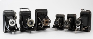 KODAK: A selection of six different vertical-folding cameras, with various lens and shutter combinations. (6 cameras)