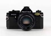 ASAHI KOGAKU: 1976 black-body Pentax MX SLR camera [#4307675], with SMC Pentax-M 50mm f1.7 lens [#6461336] and front lens cap. - 2