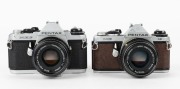 ASAHI KOGAKU: Two circa 1980 35mm SLR cameras - one Pentax ME-F [#3592021] with SMC Pentax-M 50mm f1.7 lens [#7280202], and one Pentax ME [#1407336], also with SMC Pentax-M 50mm f1.7 lens [#7244776]. (2 cameras) - 2