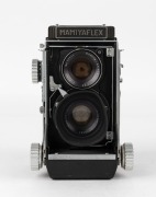 MAMIYA: Mamiyaflex C2 TLR camera [#94681], circa 1957, with rare Mamiya-Sekor 80mm f3.7 lens [#18382], and rubber lens hood.  - 2