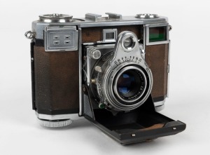 ZEISS IKON: Contessa 533/24 horizontal-folding rangefinder camera [#B 66409], circa 1950, with Tessar 45mm f2.8 lens [#1258990]. 