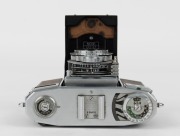 ZEISS IKON: Contessa 533/24 horizontal-folding rangefinder camera [#B 66409], circa 1950, with Tessar 45mm f2.8 lens [#1258990].  - 2