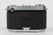 ZEISS IKON: Contessa 533/24 horizontal-folding rangefinder camera [#B 66409], circa 1950, with Tessar 45mm f2.8 lens [#1258990].  - 4