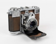 ZEISS IKON: Contessa 533/24 horizontal-folding rangefinder camera [#B 63559], circa 1951, with Zeiss-Opton Tessar 45mm f2.8 lens [#972024].