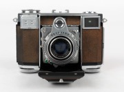 ZEISS IKON: Contessa 533/24 horizontal-folding rangefinder camera [#B 63559], circa 1951, with Zeiss-Opton Tessar 45mm f2.8 lens [#972024]. - 2