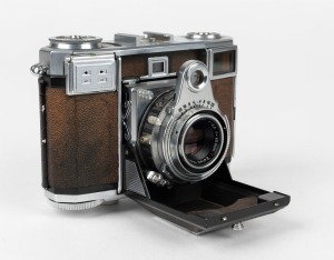 ZEISS IKON: Contessa 533/24 horizontal-folding rangefinder camera [#S 8416], circa 1950, with Zeiss-Opton Tessar 45mm f2.8 lens [#559388].