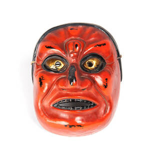 KABUKI MASK: Japanese red lacquered finish, 20th century. 15.5 x 20cm