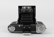 ZEISS IKON: Ikonta 521/16 horizontal-folding camera [#E 83305*], circa 1948, with rare Opton Tessar 75mm f3.5 lens [#10819] and Compur-Rapid shutter. - 4