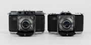 ZEISS IKON: Two horizontal-folding cameras - one circa 1951 Contina I 522/24 [#A 99978], and one circa 1952 Contina II 524/24 [#B 13993], both with Novar 45mm f3.5 lenses and Prontor-SV shutters. (2 cameras) - 2