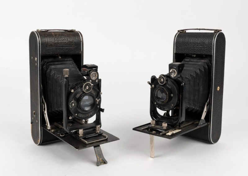 ZEISS IKON: Two circa 1927 Cocarette vertical-folding cameras - one with Novar 130mm f6.3 lens [#842312] and Derval shutter, and one with Tessar 120mm f4.5 lens [#841731] and Compur shutter. (2 cameras)