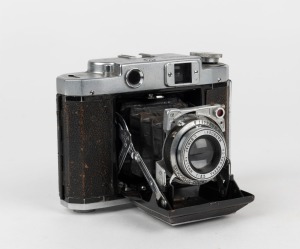 MAMIYA: Mamiya-6 IV horizontal-folding camera [#35225], circa 1947, with C. Simlar 75mm f3.5 lens [#360641] and Seikosha-Rapid shutter. 'Made in Occupied Japan' engraved on camera base.