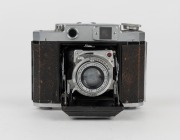 MAMIYA: Mamiya-6 IV horizontal-folding camera [#35225], circa 1947, with C. Simlar&nbsp;75mm f3.5 lens [#360641] and&nbsp;Seikosha-Rapid&nbsp;shutter.&nbsp;'Made in Occupied Japan' engraved on camera base. - 2