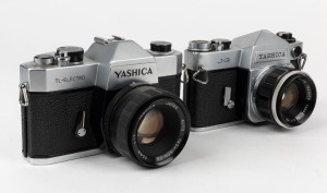 YASHICA: Two 35mm SLR cameras - one circa 1963 Yashica J-3 [#5315352] with Auto Yashinon 50mm f2 lens, and one circa 1972 Yashica TL-Electro [#21100148] with Auto Yashinon-DS 50mm f1.7 lens, both with metal front lens caps. (2 cameras) 