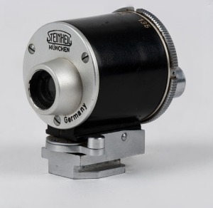 DIAX: Steinheil München triple-turret viewfinder attachment for 35mm, 90mm, and 135mm rangefinder cameras.