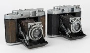 MAMIYA: Two Mamiya-6 IV horizontal-folding cameras - one 1947 example [#31343] with rare Neocon 75mm f3.5 lens [#1869] and Stamina shutter, and one 1957 example [#71845] with Olympus Zuiko F.C. 75mm f3.5 lens [#626785] and&nbsp;Seikosha-Rapid shutter. (2 camer