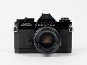 ASAHI KOGAKU: Black-body Pentax Electro Spotmatic SLR camera [#5561500], circa 1972, with SMC Takumar 50mm f1.4 lens [#5737919] and metal front lens cap. - 2