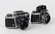 IHAGEE: Two circa 1967 Exakta VX 1000&nbsp;SLR cameras - one [#1168871] with Pancolar&nbsp;50mm f2 lens [#8231809], and one [#1141711] with S-Travelon&nbsp;50mm f1.8 lens [#389049]. (2 cameras)