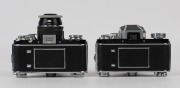 IHAGEE: Two circa 1963 SLR cameras - one Exakta Varex IIa&nbsp;[#975358] with Heinz Kilfitt 40mm&nbsp;f2.8 lens [#245-7884], lens cap, and magnifying unit, and one Exakta Varex IIb [#1086306] with Pancolar 50mm f2 lens [#7106139] and metal lens cap. (2 cameras) - 3