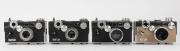 ARGUS: Four mid 20th-century rangefinder cameras - one Argus C3 Matchmatic [#1828461055], two Argus C3s [#700 570 & 820 232], and one Argus C2 [#68 997]. (4 cameras) - 2