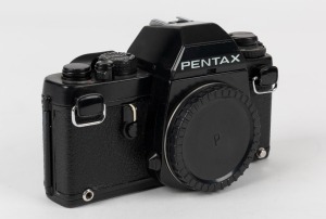 ASAHI KOGAKU: Black Pentax LX SLR camera body [#5234799], circa 1980, with plastic body cap.