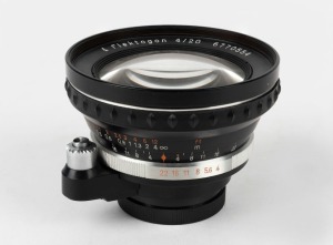 CARL ZEISS JENA: Flektogon 20mm f4 wide-angle lens [#6770554] with Exakta mount, circa 1963, together with rear lens cap.