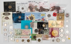Coins - Australia: An accumulation including 1927 Florin, 1966 50c (2), 1990 2c Proof, 2011 20c RAM Roll, New Guinea 1926 & 1938 Shillings EF, a 1oz silver ingot, and much more incl pre-decimal copper, some foreign, etc. Also $10 Bicentennial Banknote in folder and gold-plated $5 replica. (qty).