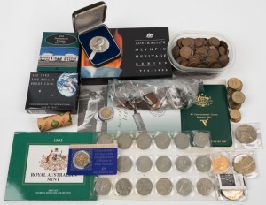 Coins - Australia: A decimal period accumulation including 1982 Unc set in wllet; 1985 Unc set; 1992 $5 Space Proof; 1994-96 $10 Olympic Heritage Proof set of 6 in case; 1997 $1 silver Parliament House Proof; 1993 $1 Armaguard Roll; and various other loose items. (qty).